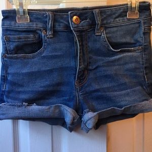 Denim shorts. Great stretch cuffed bottoms .